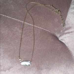 White Opal Stone with Small Crystals. Gold chain.